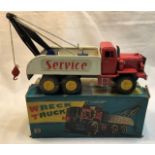 Tinplate: A boxed, tinplate, friction drive, SSS of Japan Wreck Truck, in original box. In good used