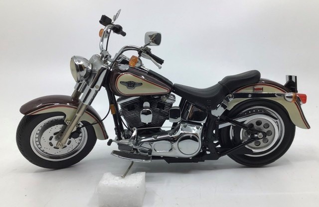 Franklin Mint: A boxed Harley Davidson 1998 Fat Boy by Franklin Mint. Boxed with papers and Hemet.