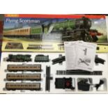 Hornby: A boxed Hornby Flying Scotsman set R 1072. Complete and unused. Some box damage to end