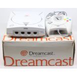 Sega: A boxed Sega Dreamcast Console, US Version, complete with controller and instructions.