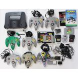 Nintendo: A collection of assorted Nintendo 64 items to comprise: black console, no Power Supply;