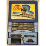 Hornby: A boxed Hornby Dublo OO gauge 3-rail EDG18 train set in very good original condition.