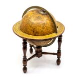 A late Victorian Newtons New and Improved Celestial globe, on turned mahogany stand, stamp to body