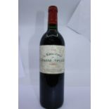 A bottle L’ermitage chasse- Spleen 1995  Haut- Medoc, a classic Bordeaux burgundy blend, that