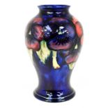The Mitchell Collection of Moorcroft Pottery: A William Moorcroft 'Pansy' pattern 65 shape vase on