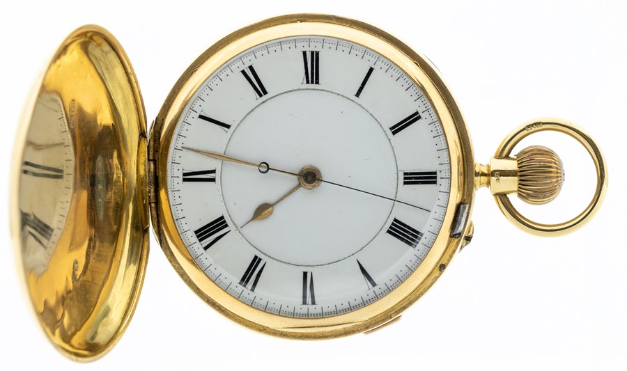 An 18ct gold hunter pocket watch, enamel dial with black Roman numerals and outer seconds track,