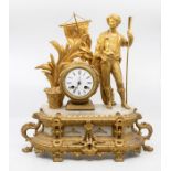 A 19th century French gilt spelter and alabaster figural mantel clock. cast with a young male, reeds