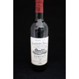 A Bottle of Chateau Tayac Margaux 1998 , A red and savoury classic wine, produced in medoc Bordeaux,