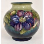 The Mitchell Collection of Moorcroft Pottery: A Walter Moorcroft 'Clematis' pattern 38 shape globe