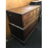 A George III mahogany chest on chest, crossbanded top, two short over one long drawer to the upper