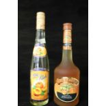 Two Bottles of Peach Liqour