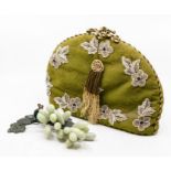 **WITHDRAWN** A Victorian / Edwardian beadwork tea cosy, with floral decoration, padding silk