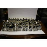 A Collection Of KLM Porcelain Houses. From The BOLS Distillery, These Are Filled With Genever, All