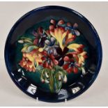 The Mitchell Collection of Moorcroft Pottery: A Walter Moorcroft 'Spring Flowers' pattern plate on