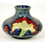 The Mitchell Collection of Moorcroft Pottery: A William Moorcroft 'Claremont' pattern vase on blue/