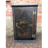 A George III black lacquered corner wall hanging cupboard, circa 1770, chinoiserie decoration of
