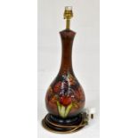 The Mitchell Collection of Moorcroft Pottery: A Walter Moorcroft Flambe 'Orchid' pattern table