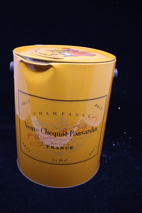 A gift set of four bottles of Veuve Cliquot Ponsardin, Brut, Reims France (4x 20cl). Dents to the