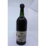 A bottle of Taylors Vintage Port 1966, Creamy Toffee And Brulee, Flavours Ruby in Colour. Damage
