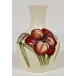 The Mitchell Collection of Moorcroft Pottery: A Moorcroft 'Freesia' pattern vase on a white