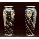 A pair of Royal Doulton slender baluster vases possibly decorated by Mary Butterton. Height approx