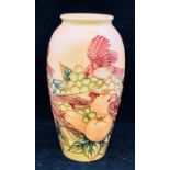 A Moorcroft 'Finches Ochre' pattern baluster vase designed by Sally Tuffin. Height approx 26cm.