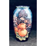A Moorcroft 'Finches' pattern baluster vase, blue ground designed by Sally Tuffin. Height approx