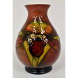 The Mitchell Collection of Moorcroft Pottery: A Moorcroft Flambe 'Orchid' pattern 7 kiln shape