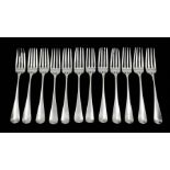 A set of twelve George III silver Old English Pattern table forks, the reverse handle engraved