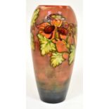 The Mitchell Collection of Moorcroft Pottery: A Walter Moorcroft Flambe 'Columbine' vase on blue/