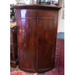 **WITHDRAWN** A George III mahogany wall hanging corner cupboard, 115.5cm high x 79cm wide