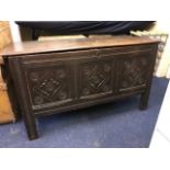 A late 17th Century oak chest, hinged cover, the triple panel frieze carved with lozenges and