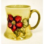 The Mitchell Collection of Moorcroft Pottery: A Moorcroft 'Clematis' pattern tankard shape mug on