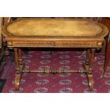 A Victorian burr walnut writing table, shaped rectangular top inset with tooled leather top, stepped