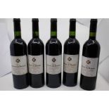 Five bottles of Croix Des Bardes LLande De Pomerol, red wine with a classic savoury taste pairs well
