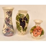 A Moorcroft Hibiscus pattern ovoid vase. Height approx 13cm.; a Daisy pattern vase for the Moorcroft