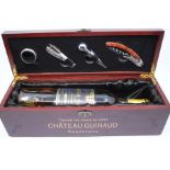 One Bottle of Chateau Guiraud sauternes , in wooden presentation case, contains one bottle of