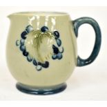 The Mitchell Collection of Moorcroft Pottery: A Moorcroft 'Leaf and Berry' pattern cream jug on