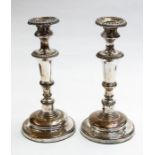 A pair of Victorian electro plated tapering candlesticks, detachable sconces, circa 1850s height