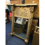 A Regency giltwood pier looking glass, circa 1825, ball cornice, wheatsheaf frieze, 81cm by 61cm,