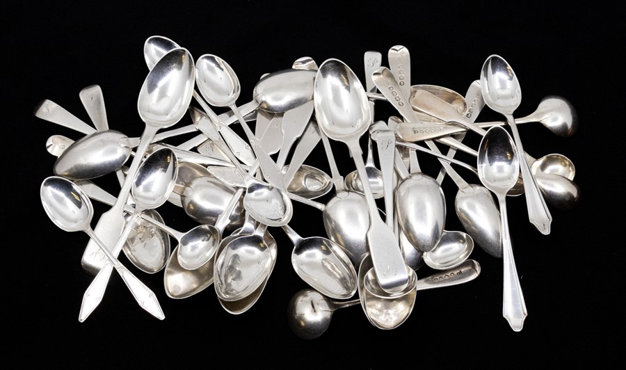 A collection of assorted silver spoons to include mainly tea spoons, pickle spoons and sugar spoons,