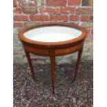 An Edwardian satinwood and crossbanded and strung oval table top bijouterie vitrine, circa 1905,
