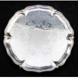 A Victorian silver salver, beaded rim, engraved centre on three ball and claw feet, by Goldsmith's