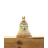 A Bell's Old Scotch Whisky bell Porcelain  decanter.  Region: Scotch Distillery: Bell's Distilled: