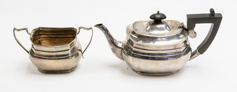 Asprey & Co: A George V part silver tea service to include teapot and sugar bowl, plain bodies,