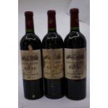 Three bottles of Les Plantes du Mayne 2004 grand cru, a savoury and classic red wine from the