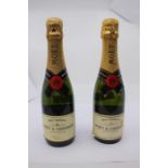 Two bottles of Moet & Chandon Champagne, 375ml , Sparkling and complex a very popular champagne that