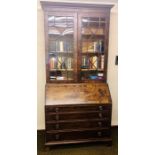 A George III mahogany glazed bookcase on bureau, circa 1780, in a Thomas Chippendale manner,