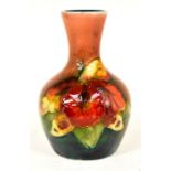 The Mitchell Collection of Moorcroft Pottery: A Moorcroft Flambe 'Orchid' pattern vase on blue/green