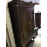 A mahogany linen press, Greek key cornice, on a stand with two drawers, height 185cm